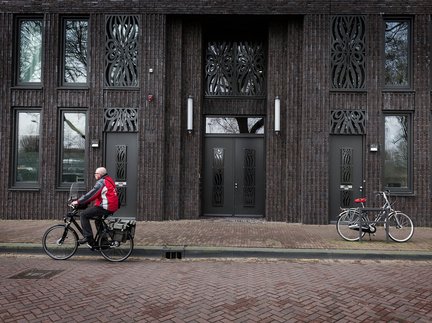 Heijmans &CO beeld met fiets op voorgrond